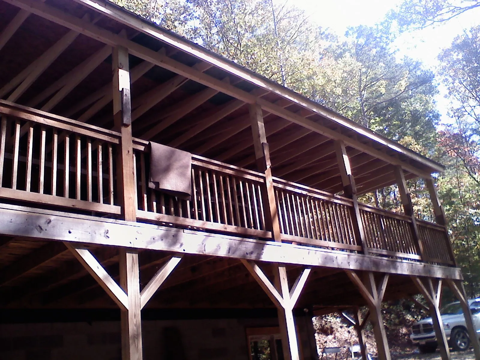 Timber framing under a new elevated porch and deck — Roof Leak Repair in Jenison by Roofing Brothers
